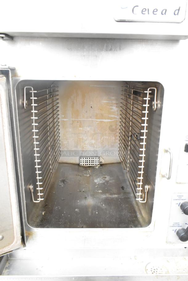 2016 Cleveland 24CGA10.2 Gemini Steam Cabinet, natural gas, 2-deck, 72,000 BTU, visible wear, interior racks intact.