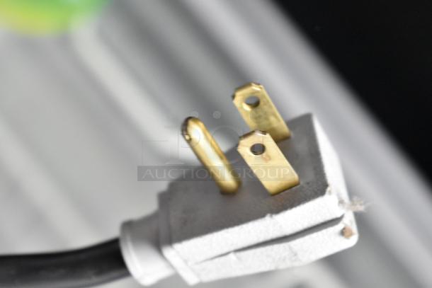 Close-up of a 115-volt power plug for a 2017 True GDM-72-HC commercial cooler.