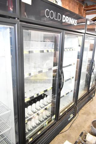 2017 True GDM-49-HC commercial 2-door cooler, model GDM-49-HC, 115 volts, 1 phase, black frame, glass doors, "Cold Drinks" signage.