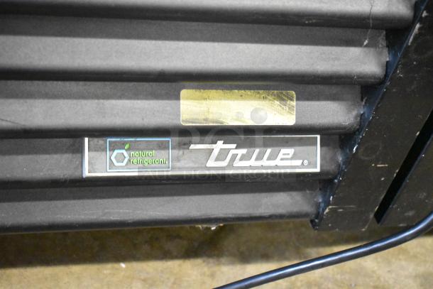 2017 True GDM-49-HC cooler, 2-door reach-in, natural refrigerant label, brand logo, 115V, 1 Phase.
