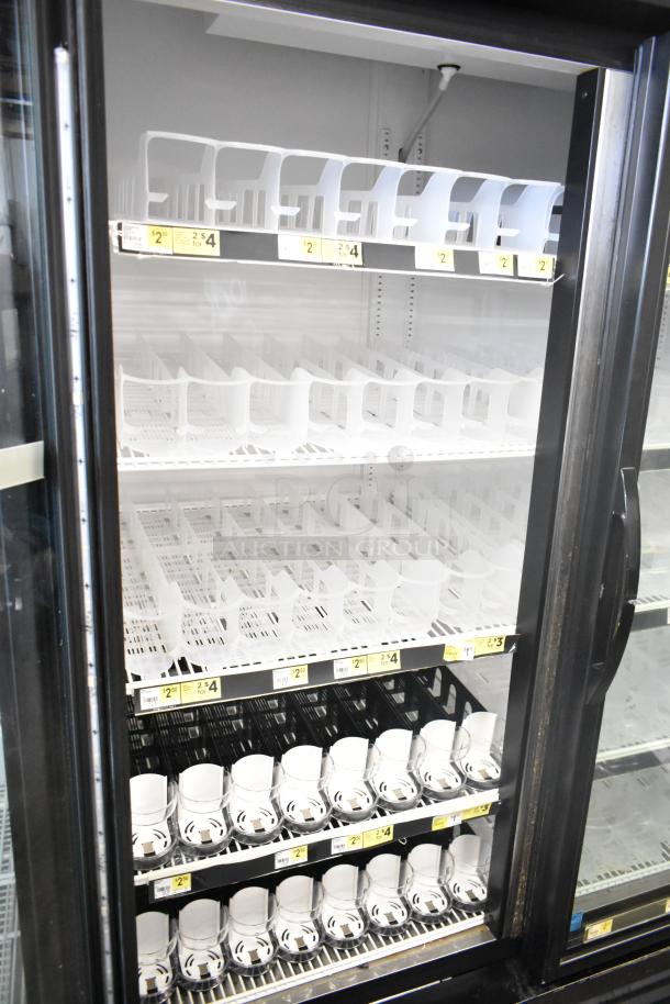 2017 True GDM-49-HC cooler merchandiser, 2-door, commercial use, 115V, pristine condition, with interior shelving.