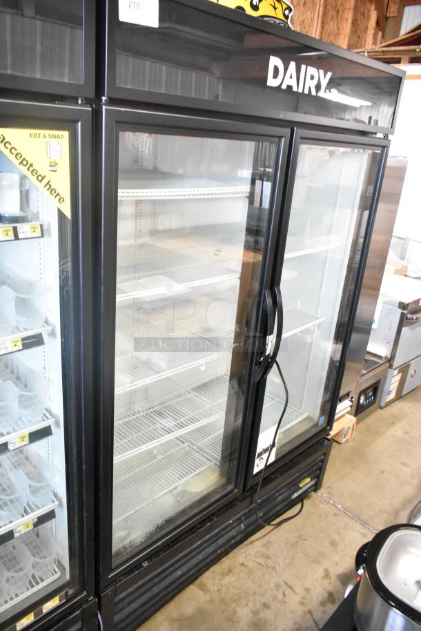 2019 True GDM-49-HC 2-door cooler merchandiser, glass doors, black frame, labeled "DAIRY," 115V, 1 phase, good condition.