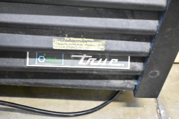 2019 True GDM-49-HC commercial cooler label, featuring natural refrigerant and True logo.