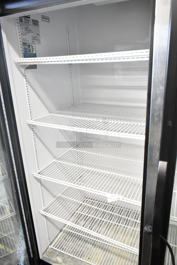 2019 True GDM-49-HC 2 Door Reach-In Cooler Merchandiser, wire shelves, 115V, visible model label.