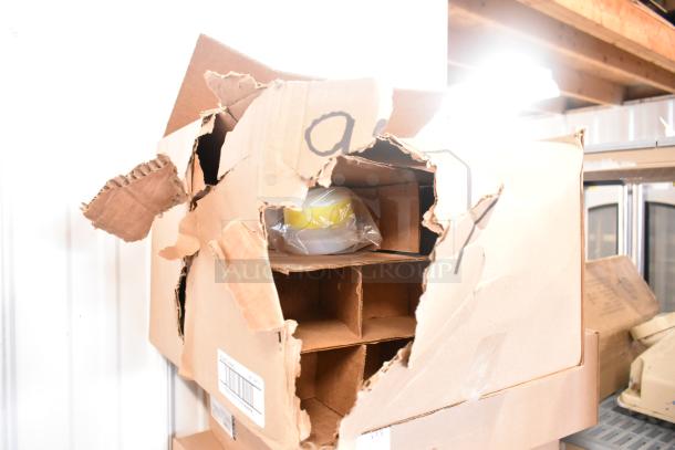 Box of Lithonia Lighting DSXF3 LED lights, model LED483788WU, scratch and dent condition, visible tear in packaging.