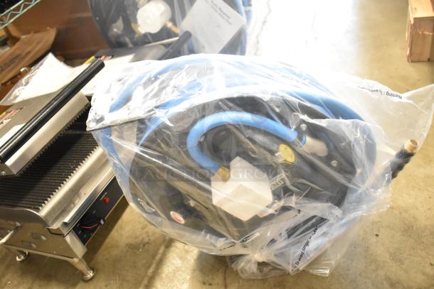 Brand new Regency 600HRPC38100 100' x 3/8" air/water hose reel. Powder-coated steel, scratch and dent condition.