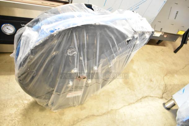 BRAND NEW SCRATCH AND DENT Regency powder-coated steel air/water hose reel with hose, partially wrapped in plastic.