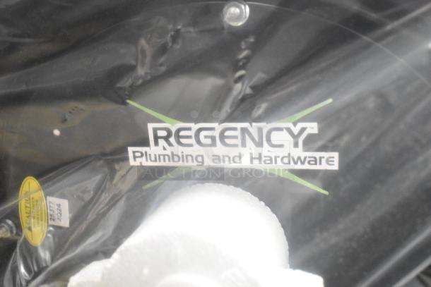 Regency powder-coated steel air/water hose reel, new with scratches, includes hose. Visible branding: "Regency Plumbing and Hardware."