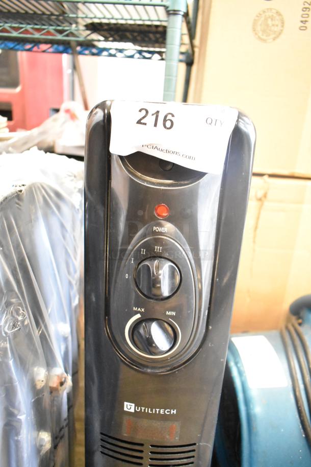 Utililtech CYWE08-7 oil-filled radiator, 120V, black, with power settings dial and auction label marked "216."