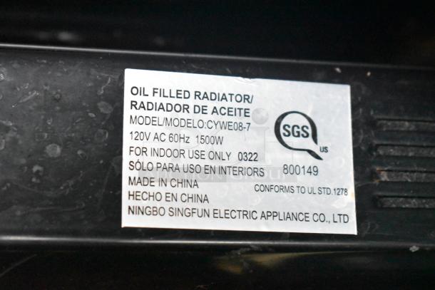 Utililtech CYWE08-7 oil-filled radiator, 120V, 1500W, for indoor use, made in China. Model label visible on black surface.