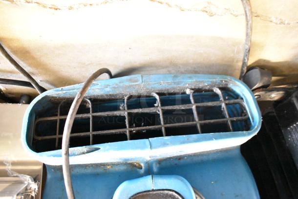 Xpower P-400 Air Mover Floor Fan in used condition, blue casing, with visible dust on the vents. 115 Volts, 1 Phase.