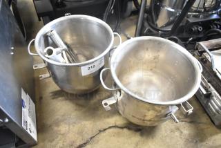 Two commercial stainless steel mixing bowls with handles and two paddle attachments, gently used. Labels indicate item lot number.