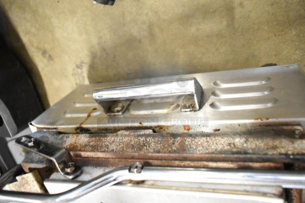 Waring WPG300 Commercial Double Panini Press, visible wear, stainless steel handle, 240V, 1 Phase.