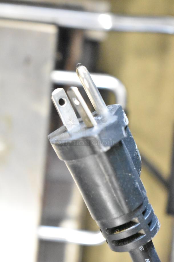 Close-up of the plug for a Waring WPG300 Commercial Panini Press, 240 volts, single phase.