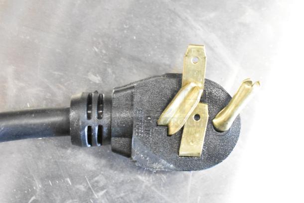 Black power plug for QNC GFII countertop electric fryer. Three-prong, compatible with 208/240 Volts, 1 Phase.