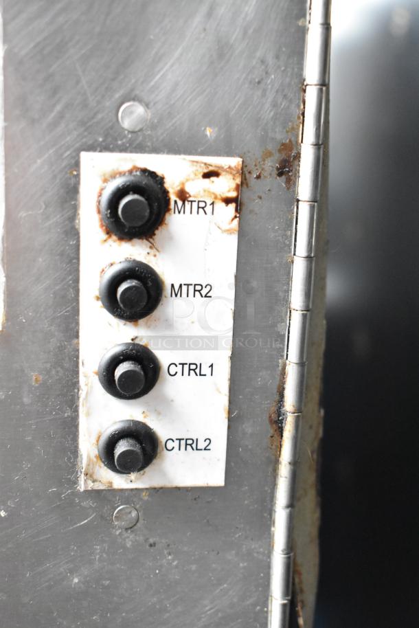 Close-up of Middleby Marshall PS638G pizza oven controls, showing four labeled buttons: MTR1, MTR2, CTRL1, CTRL2.