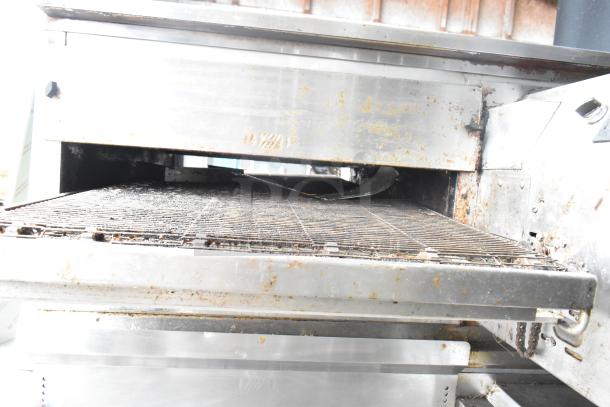 2021 Middleby Marshall PS638G commercial gas conveyor pizza oven, visible wear, on casters, 89,000 BTU capacity.