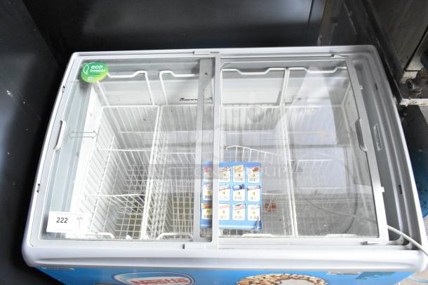 AHT RIO S 100 commercial ice cream freezer merchandiser with sliding glass doors, eco-friendly label, and commercial casters.