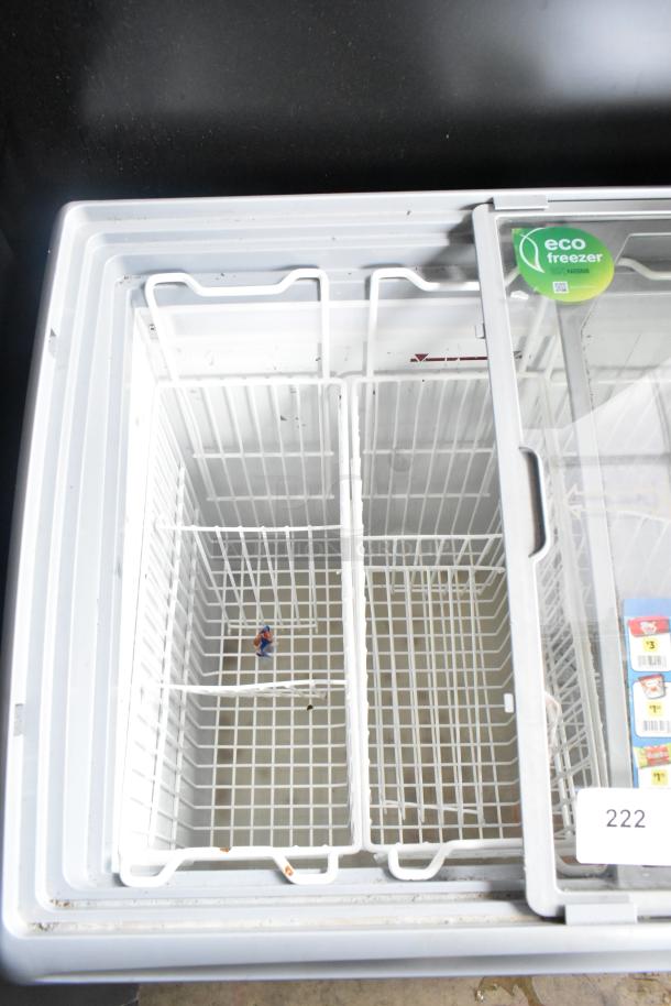 AHT RIO S 100 commercial ice cream freezer merchandiser, eco-friendly label, glass sliding lid, on commercial casters.