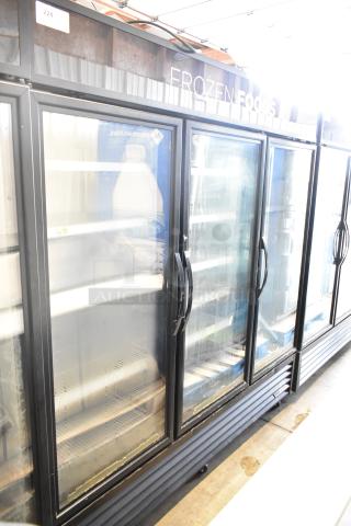 2017 True GDM-72F-HC commercial 3-door reach-in freezer merchandiser, black frame, glass doors, 115/208-230V, 1 phase.