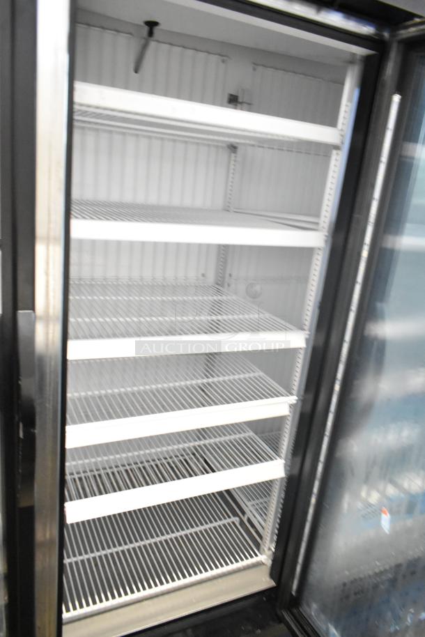 2017 True GDM-72F-HC 3-door commercial reach-in freezer, adjustable shelves, clean interior, excellent condition.