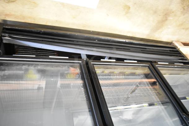 2017 True GDM-72F-HC Commercial 3 Door Reach In Freezer, glass doors, slight visible wear, 115/208-230V, 1 phase.