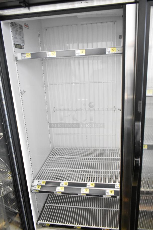 2017 True GDM-72F-HC 3 Door Commercial Freezer Merchandiser, clean condition, 115/208-230V, 1 phase, interior shelving.