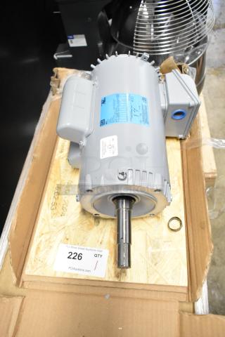 Brand new 2025 Weg Z00218ET1C052721 motor, 230 volts, scratch and dent. Includes blue label with specs, seen in open box.