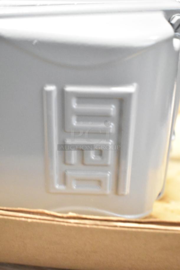 Brand new Weg 2025 Z00218ET1C052721 motor, 230V, scratch and dent. Visible branding embossed on housing.