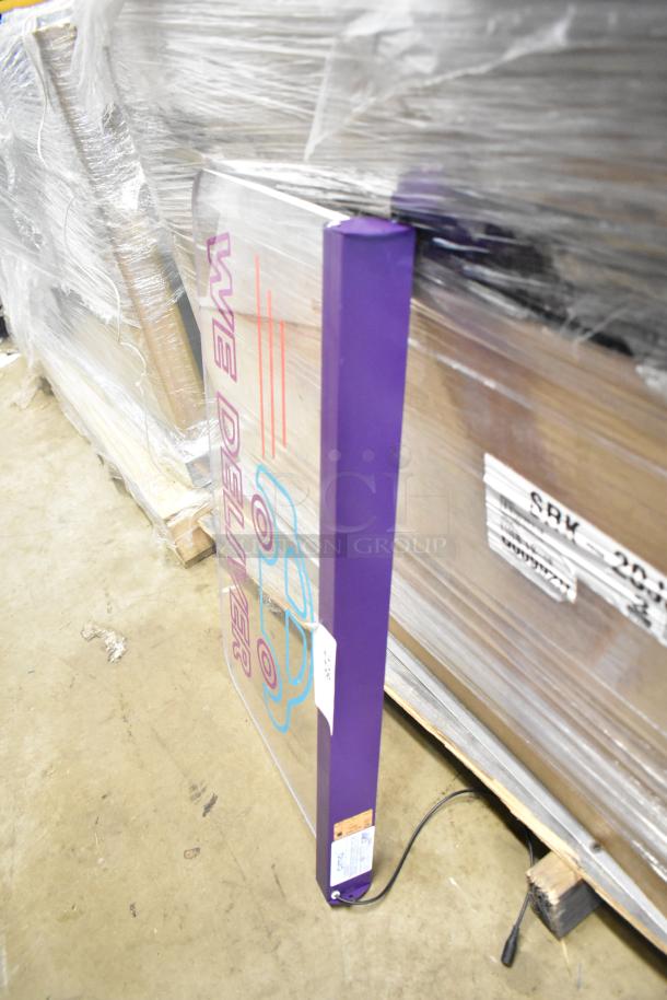 BRAND NEW SCRATCH AND DENT Cima Light, 120V, 1 Phase; purple frame, graphic reads "WE DELIVER," slight dent visible.