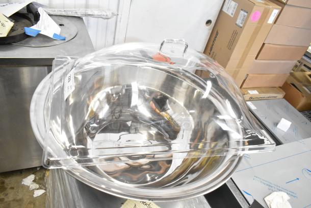 Brand new metal bowl with poly clear lid, slight scratches and dents. Auction tag visible, offers double bid return.