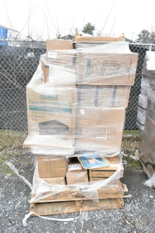 Shrink-wrapped pallet with various boxes labeled "Noble Products" and "MAR26-26," containing new scratch and dent items, including mason jars and plates.