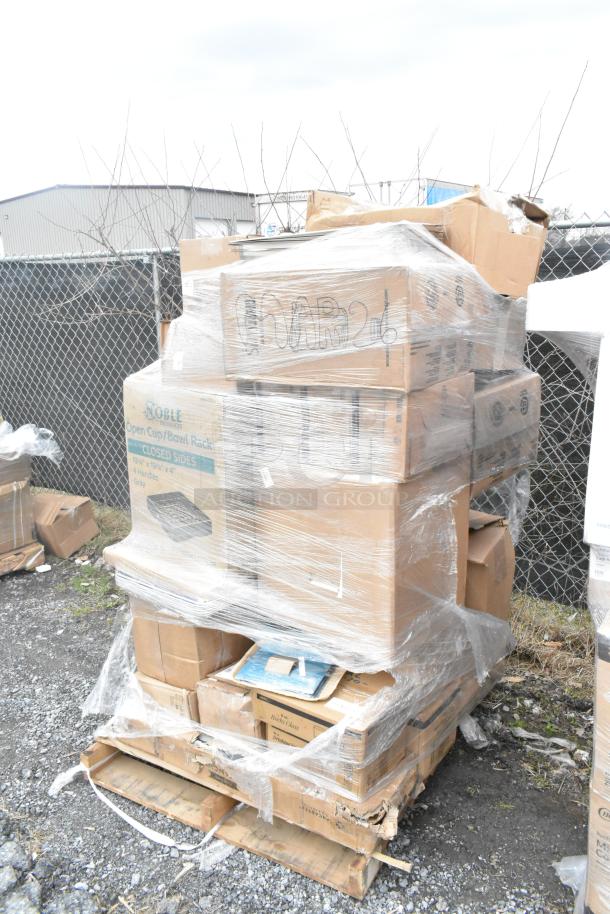 Pallet of 30 new scratch and dent items, including Mason jars and plates, wrapped in plastic for auction MAR26-26.