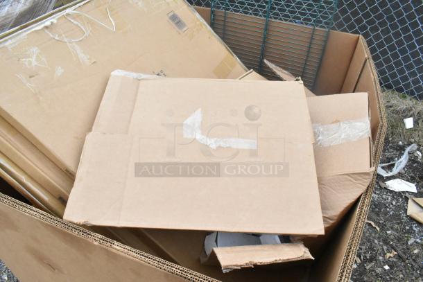 Box of 17 new scratch and dent items including table base pieces and waitress stand. Items are sealed in cardboard packaging.