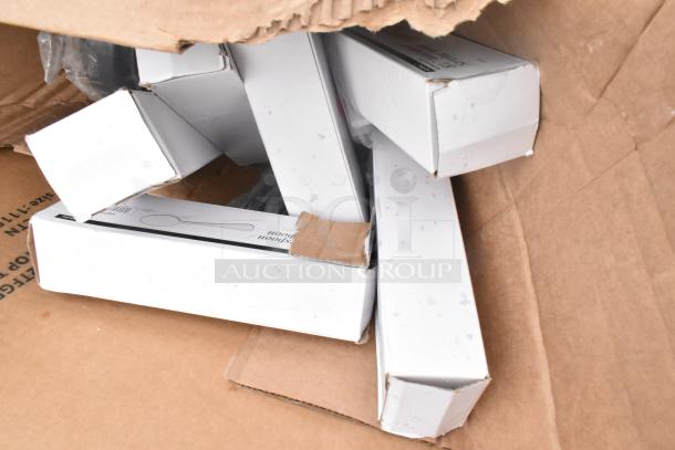 Boxes of scratch and dent items, including table base pieces and waitress stand, new condition, various labels visible.