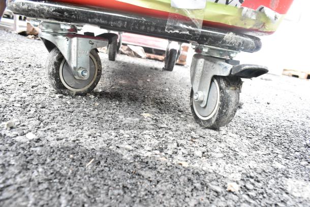 7 Lavex 47512RSRDTUB cube trucks, 12 cu. ft., 600 lb capacity, scratch and dent condition, swivel casters visible.