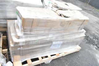 Palette with four brand new scratch and dent items, including a work table, wrapped in clear plastic. Package labeled "MAR26-16".