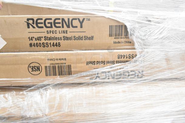 Regency 14"x48" stainless steel shelf in packaging, labeled Model #460SS1448, NSF certified, brand new condition.
