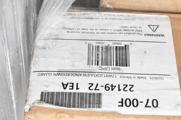 Box with barcode label and warning text, wrapped in plastic. Contains new scratch and dent items like strip warmers and glass rack.