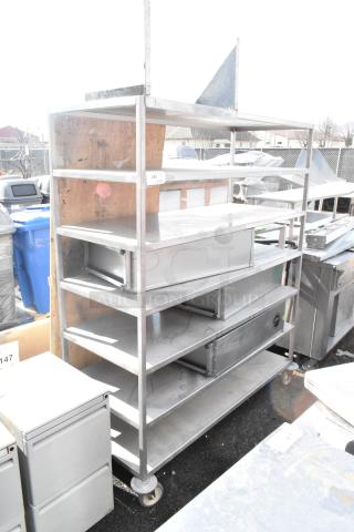 Commercial 7 Tier Shelving Unit w/ Contents on Commercial Casters.