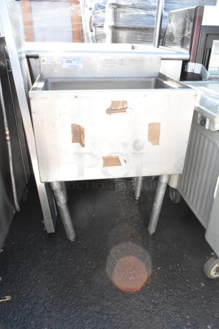 Commercial ice bin, stainless steel, used condition, standing on four legs. Secure packaging tape marks visible.