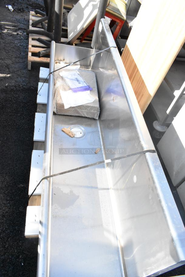 Brand new Regency 72" x 17.5" wall-mounted hand sink, designed for 3 single-inlet faucets, scratch and dent condition.