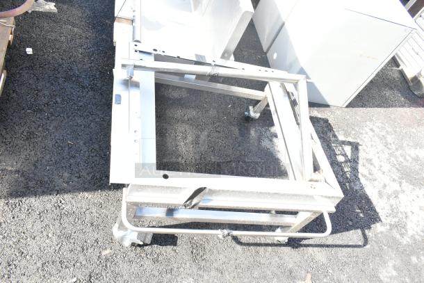 Moffat DSKE32C dolly on commercial casters, steel frame, sturdy construction, suitable for heavy loads, slightly worn condition.