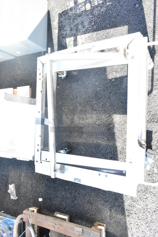 Moffat DSKE32C dolly on commercial casters, metal frame, sturdy build, suitable for heavy-duty use.