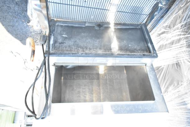 Commercial 8 Flavor Carbonated Beverage Machine on drop-in ice bin, showing top view with wiring and ice compartment detail.