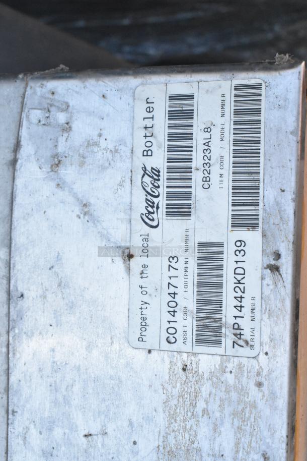 Commercial 8 Flavor Beverage Machine with Drop In Ice Bin, visible Coca-Cola branding, asset and serial numbers shown.