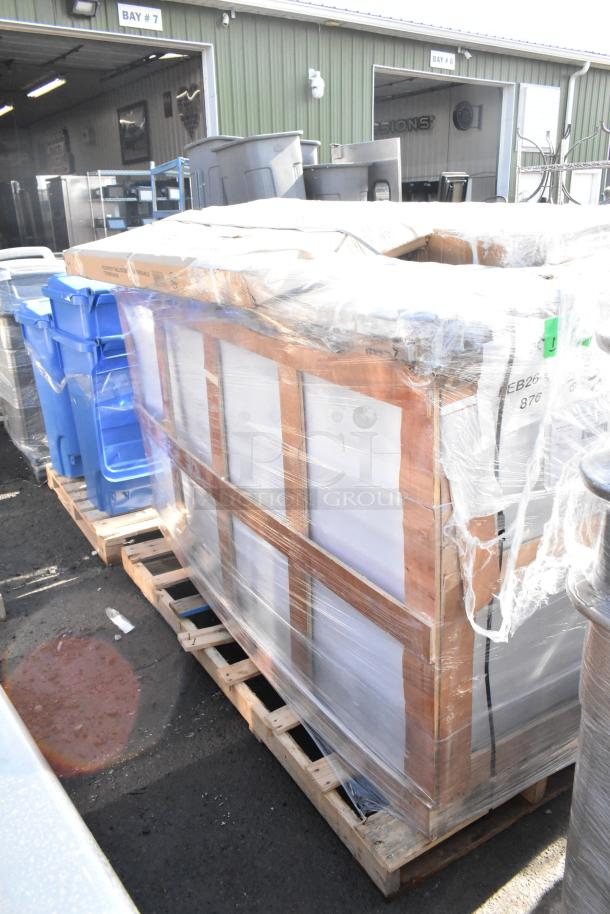 Wrapped pallet of brand new scratch and dent items, including an over shelf, on auction. Appears in excellent condition.