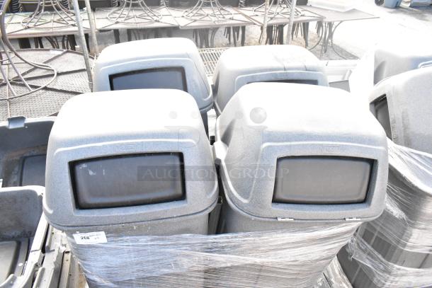 Four gray Toter poly trash can shells, auction item, visible lid openings, well-maintained, sold as a set, plastic wrap.