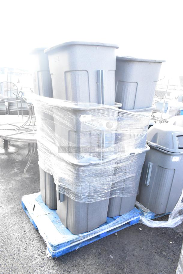 12 Toter gray poly trash can shells on pallet, wrapped in plastic. Auction item; increase bid for bulk purchase.