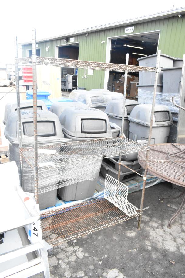 Chrome finish 3-tier wire shelving unit in used condition, requires buyer dismantling; consider freight charges.